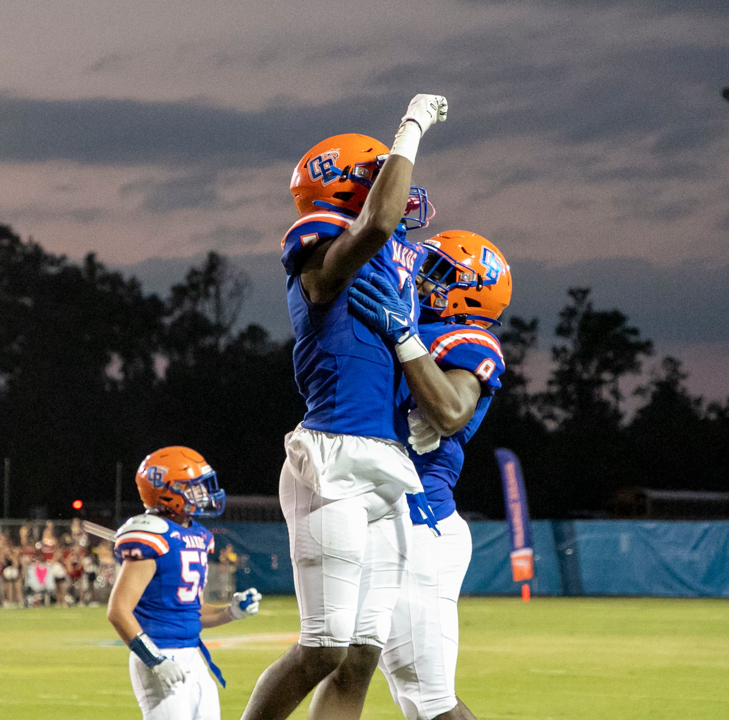 Orange Beach seniors Chris Pearson (7) and Lamar Nelson (8) celebrates Pearson’s rushing touchdown during the Makos’ region game against the T.R. Miller Tigers at home Sept. 16. Orange Beach travels to face Bayside Academy in another key region game this Friday night.