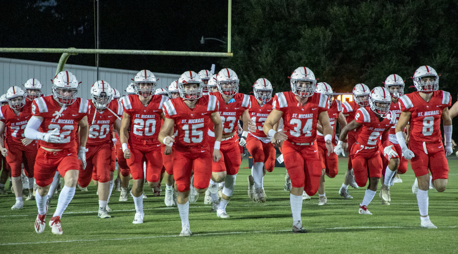 The St. Michael Catholic Cardinals take the field for their Class 4A Region 1 contest against the Orange Beach Makos at Fairhope Municipal Stadium Sept. 29. St. Michael kicks off Week 9 with a Thursday matchup against the Jackson Aggies this week.