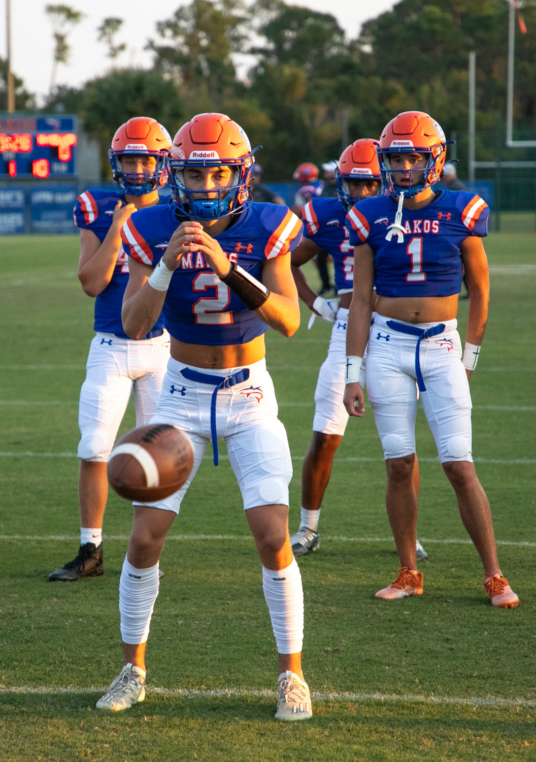 Orange Beach senior Cash Turner receives a snap during a pregame drill before the Makos’ Class 4A Region 1 game against the T.R. Miller Tigers at the Sportsplex Sept. 16. Orange Beach hosts Wilcox Central this Friday in another region battle.