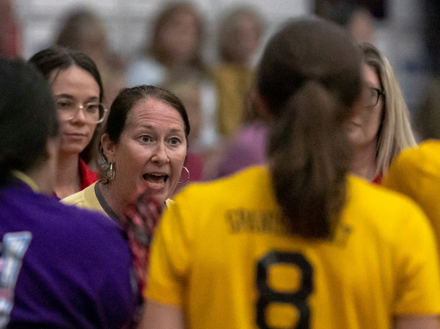 Gretchen Boykin meets with the Spanish Fort Toros before the fifth and decisive set of the Class 6A Area 2 tournament against the Bayside Academy Admirals on Oct. 13, 2022. Now in her 19th season as a high school head coach, all 18 of Boykin’s previous teams have claimed their area championship.