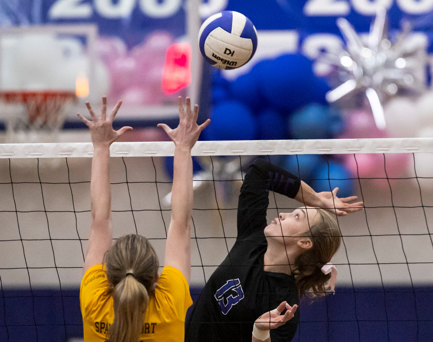 Bayside Academy sophomore Misty Kate Smith rises for a spike during the Admirals’ tournament championship game against Spanish Fort Thursday night at home.