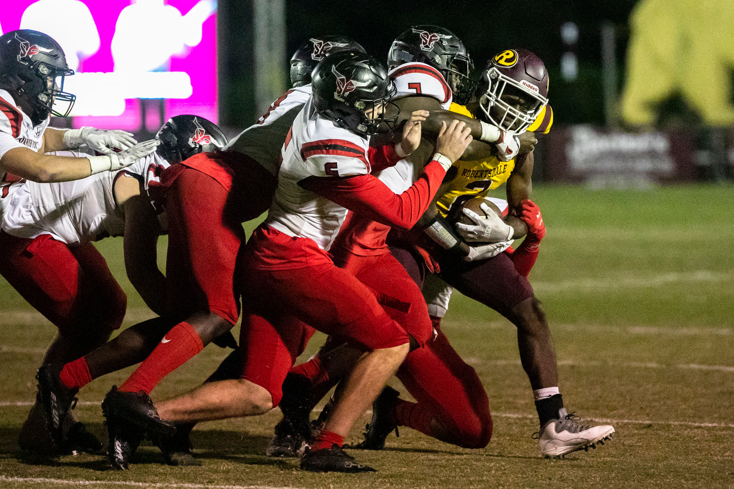 The Toro defense converges on Robertsdale running back Glen Williams in the first half of Spanish Fort’s 41-13 win over the Golden Bears in region play Friday night. The Toros registered a second-half shutout to seal the victory.