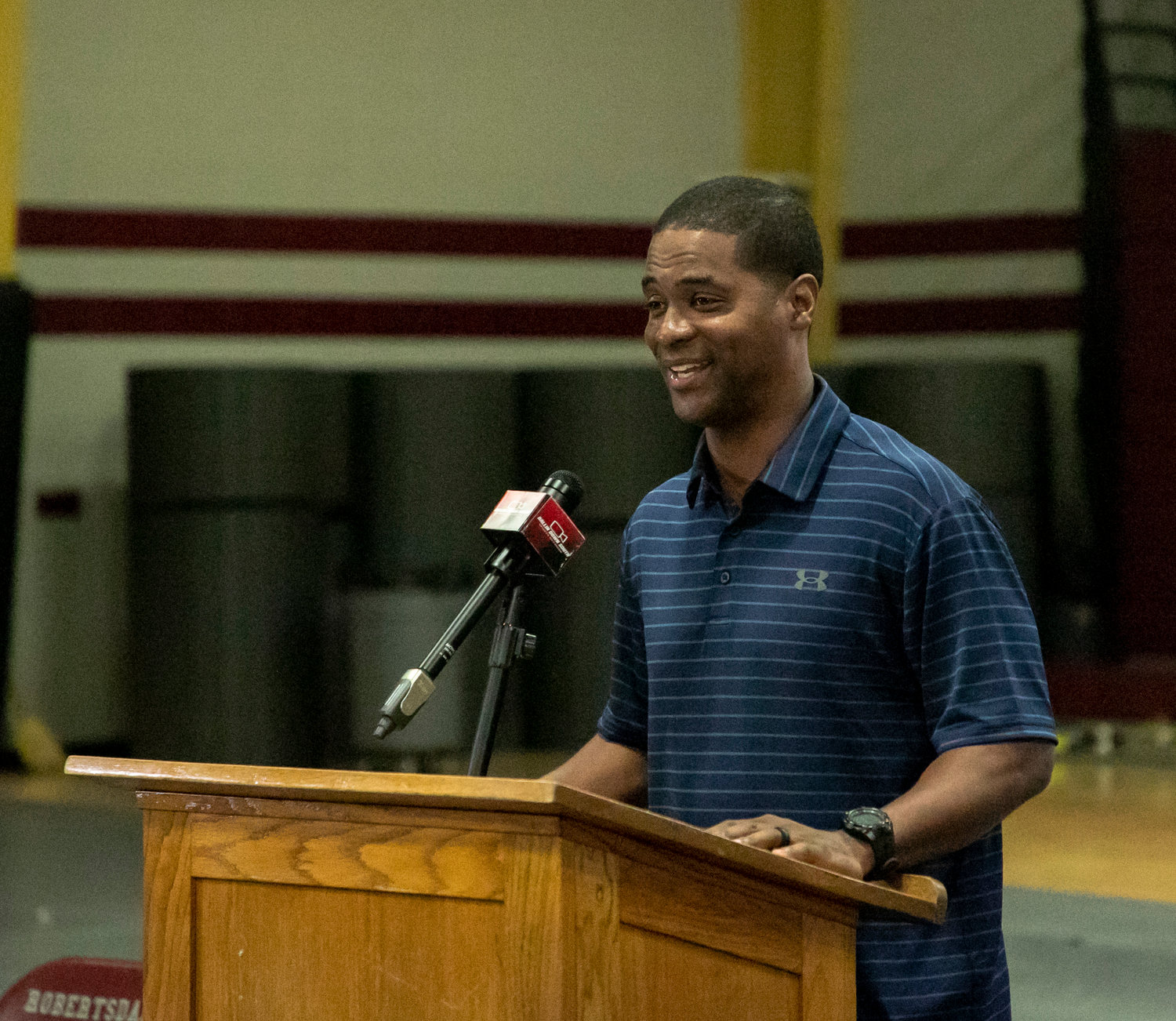 First year Foley head boys' basketball coach Kason Whitten took the podium and represented the Lions at Ballin Down South's media day event at Robertsdale High School Sunday, Oct. 16.