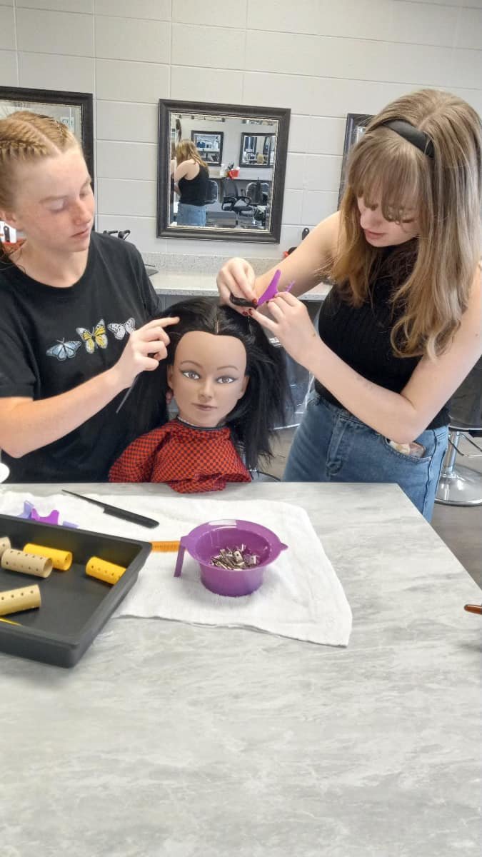 Two of the students performing in Foley High School’s upcoming production of “Steel Magnolias” visited the South Baldwin Center for Technology, where they learned from the cosmetology department how to roll, shampoo and style hair - all things they will be doing live on stage.