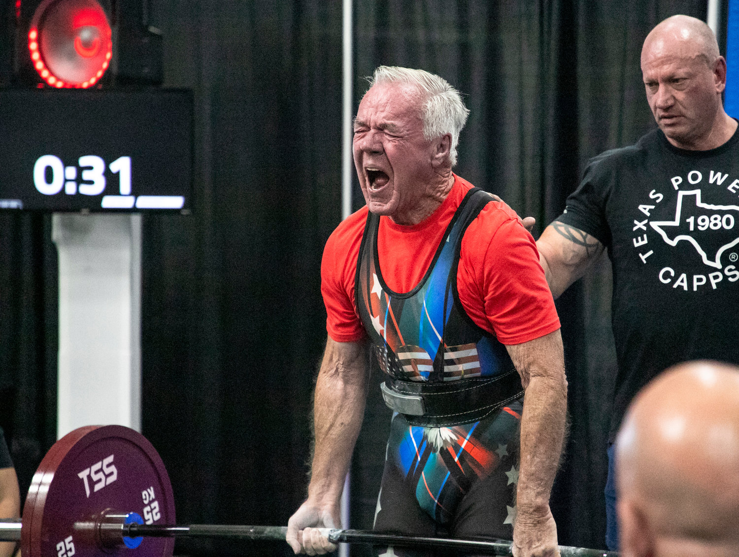 84-year-old Michael Harrington deadlifts a state record 297.6 pounds (135 kg) as part of Day 1 of competition at the International Powerlifting League’s world championship meet hosted at the Orange Beach Event Center.