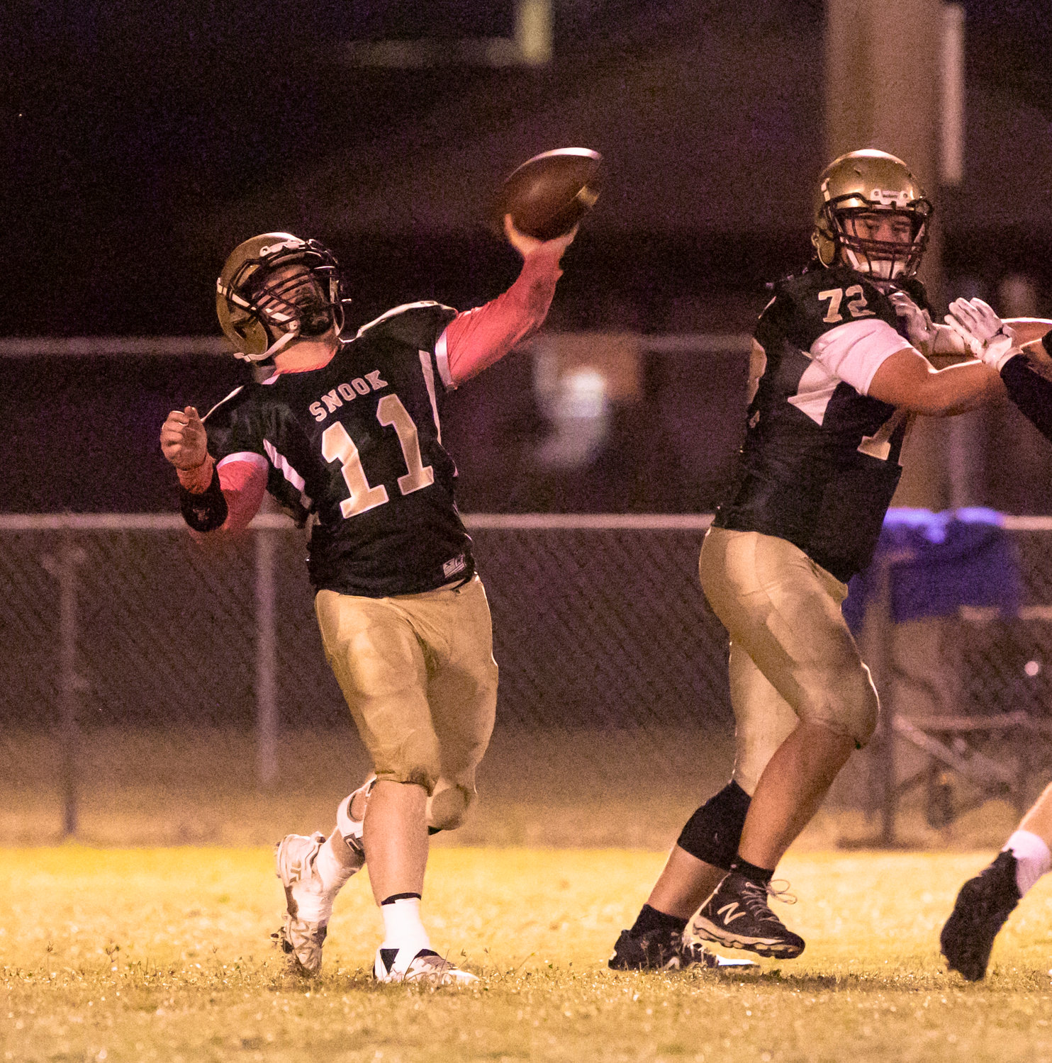 Eagle senior Philip Butts launches a throw downfield during Snook Christian Academy’s home game against the Crenshaw Cougars at Summerdale Junior High Friday night. Butts was recently announced as the school’s first AISA All-Star representative.