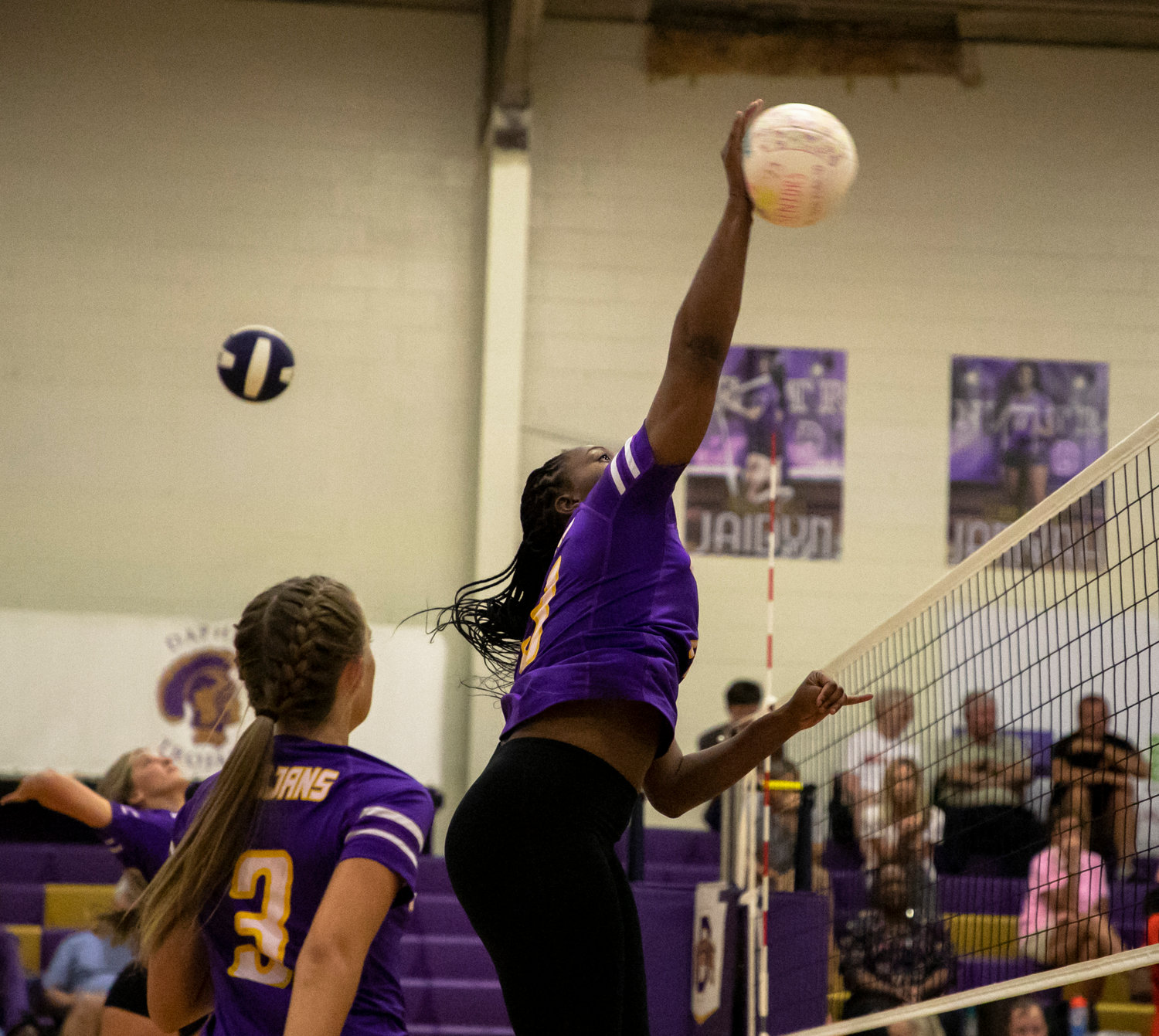 Trojan senior Janiyah King goes through warmups ahead of the Class 7A Area 2 match against the McGill-Toolen Yellow Jackets at Daphne High School Sept. 20. King closed her high school career as one of three Trojan representatives named all-state by the Alabama High School Volleyball Coaches Association.