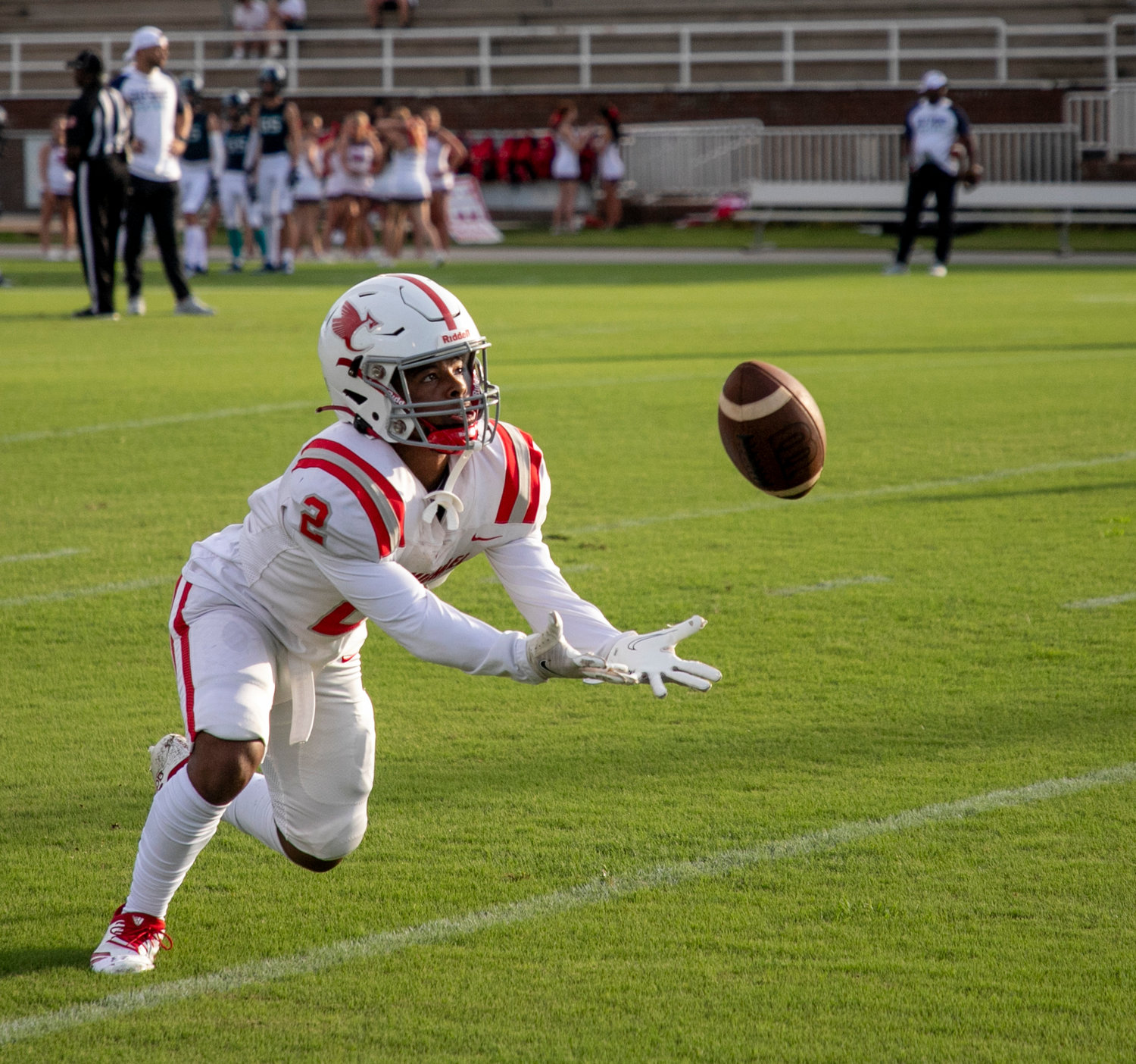 St. Michael senior Braylan Green looks in a punt attempt during warmups ahead of the Cardinals’ season-opening contest against the Gulf Shores Dolphins Aug. 18. Green helped St. Michael rack up 281 points on the season, including a program-record 49 points in the win over Orange Beach.