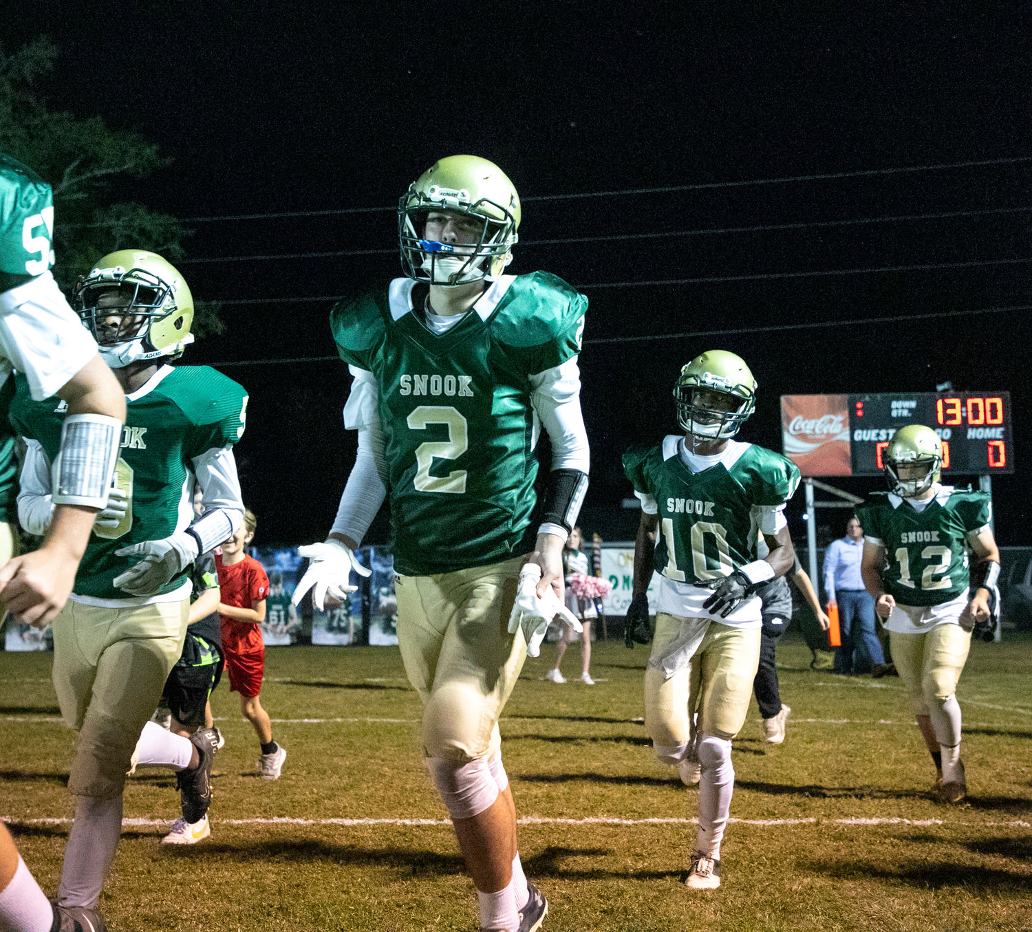 The Snook Christian Academy Eagles take the field ahead of their regular-season finale game against the Crenshaw Christian Cougars at the Summerdale School Oct. 28. Snook opens its second playoff appearance this Friday on the road.