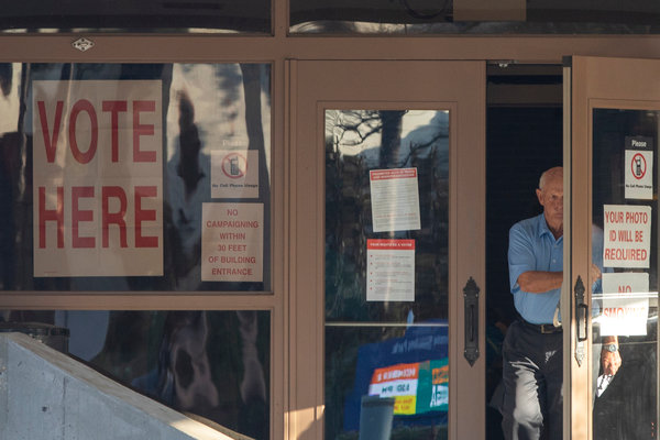 A voter exits the Erie H. Meyer Civic Center, a Gulf Shores voting precinct, on Tuesday afternoon.