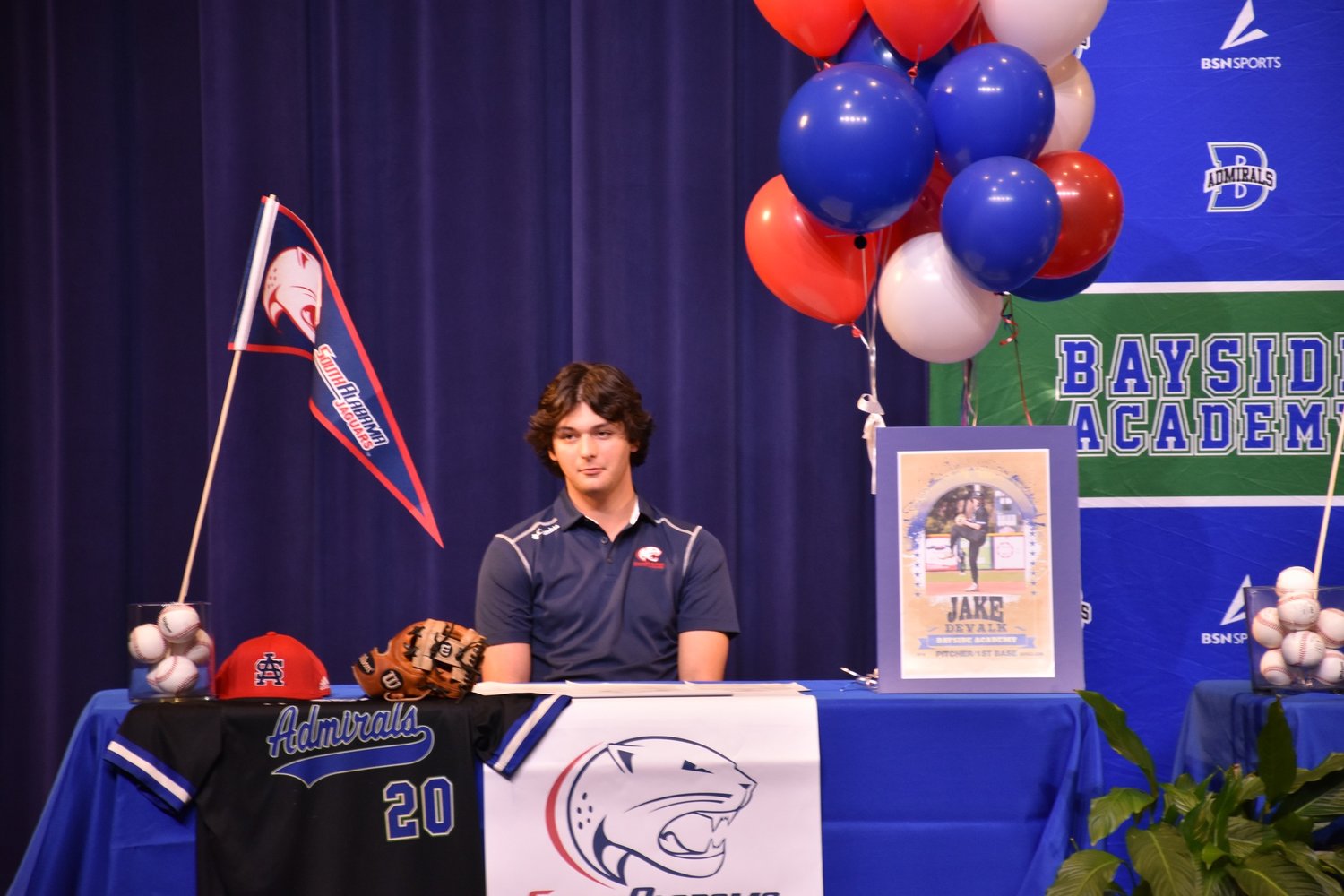 Jake DeValk will stay in state and join the South Alabama Jaguars after his final season with Bayside Academy. The Admiral senior signed his National Letter of Intent Wednesday, Nov. 9, at the high school.