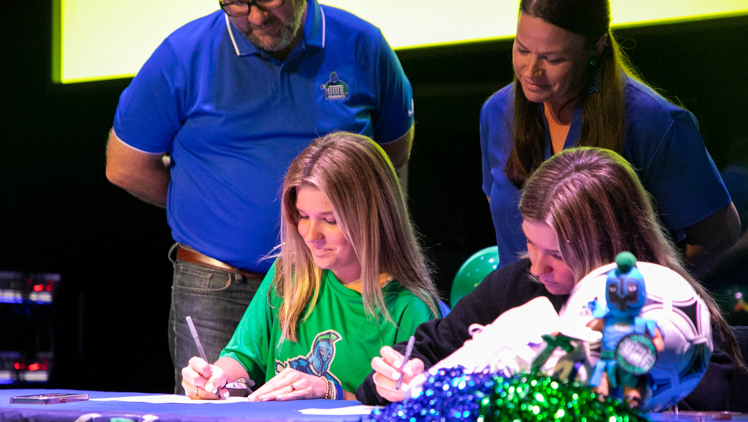 Addison and Emily Smith put pen to paper and sign their National Letters of Intent to join the West Florida Argonauts soccer team after their final season with the Fairhope Pirates during a signing ceremony at 3Circle Church in Fairhope Thursday, Nov. 10.