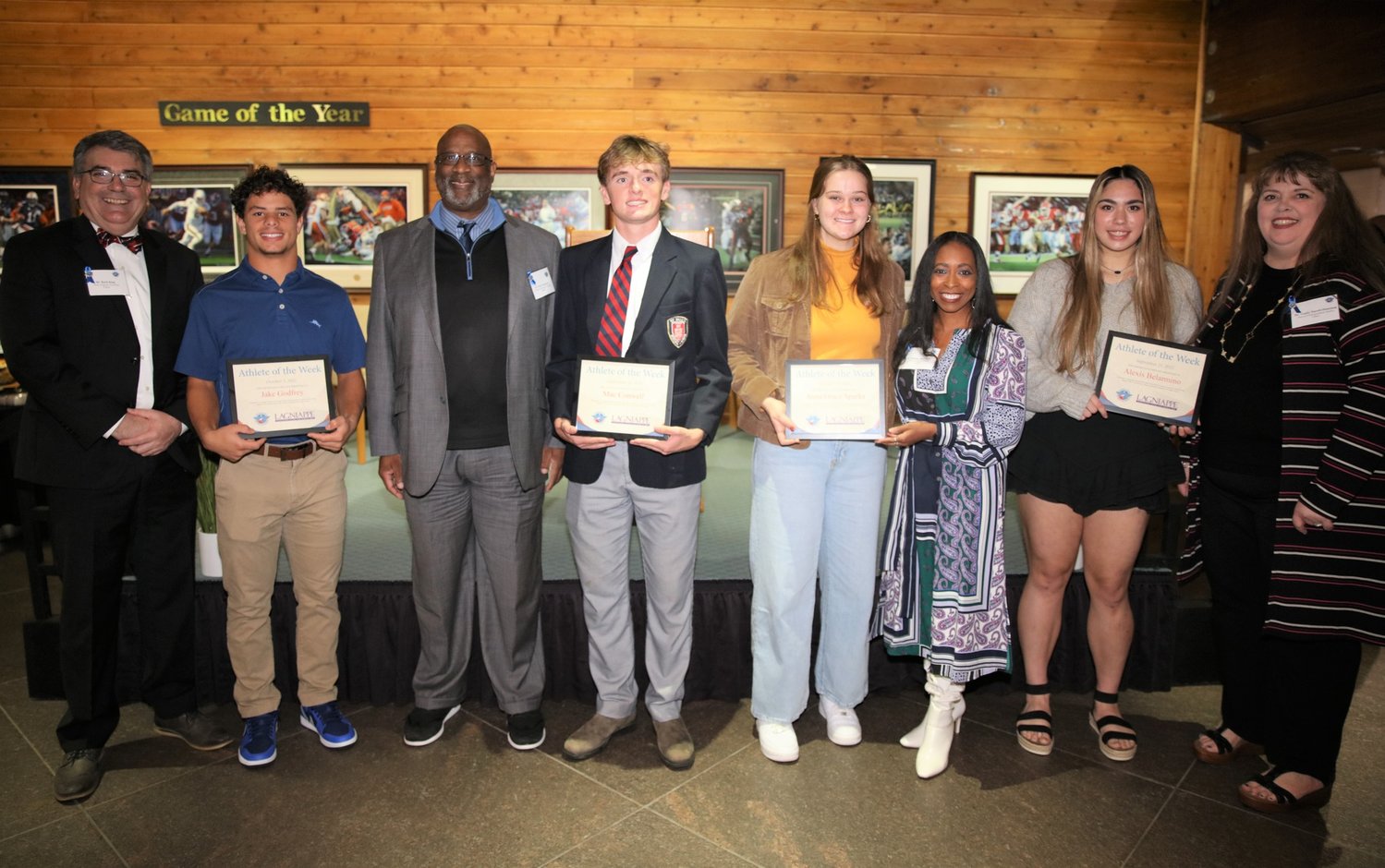 Spanish Fort’s Jacob Godfrey, second from left, and Alexis Belarmino, second from right, were among the student-athletes of the week recognized at the United States Sports Academy’s annual Awards of Sport program Thursday, Nov. 10, in Daphne.
