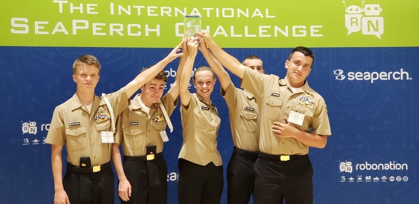 Pictured here, RHS SeaPerch cadets, from left, Gavin Brannon, Bryce Simmons, Victoria Burkhardt, David McCarn and Austin Prather hoist the Resiliency and Grit Award at the SeaPerch International Challenge. The award is just one of five special awards presented at the event.