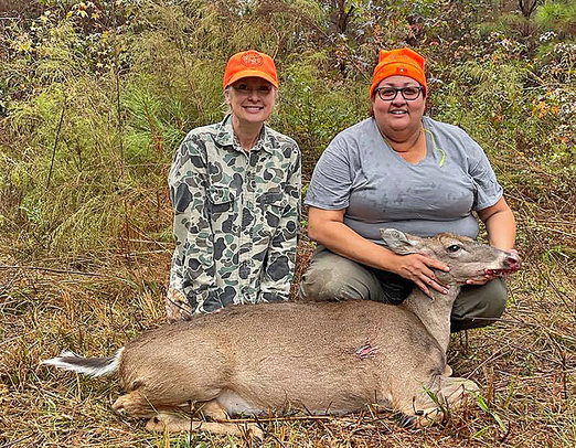 WFF Outreach Coordinator Marianne Gauldin, left, helped Yvette Harris harvest a doe during a recent mentored hunt.