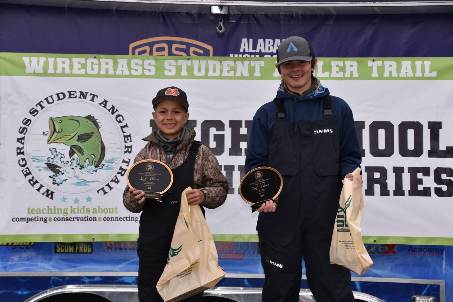 Hunter Robertson and Wyatt Lee hold their third-place plaques from the Wiregrass Student Angler Trail’s season finale tournament on Lake Eufaula last Saturday, Nov. 19. The pair hauled in two fish for 4.44 total pounds.