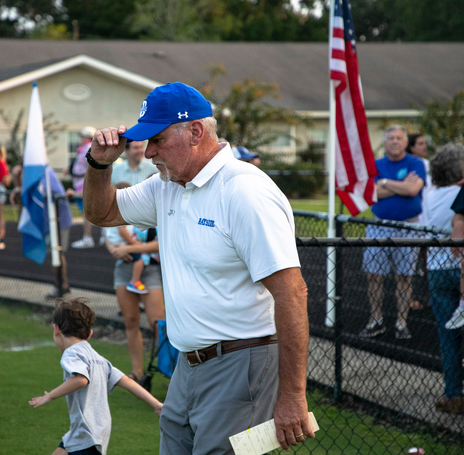 Phil Lazenby takes the field before Bayside Academy’s home contest against the St. Michael Catholic Cardinals Sept. 2 at Freedom Field in Daphne. After 16 seasons as the head football coach, Lazenby recently stepped down from the Admirals program with 115 wins at the school.
