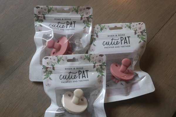 Ryan & Rose, a small company in Tennessee, purchased Feller's patent and produce the pacifier, now called the cutie Pat.