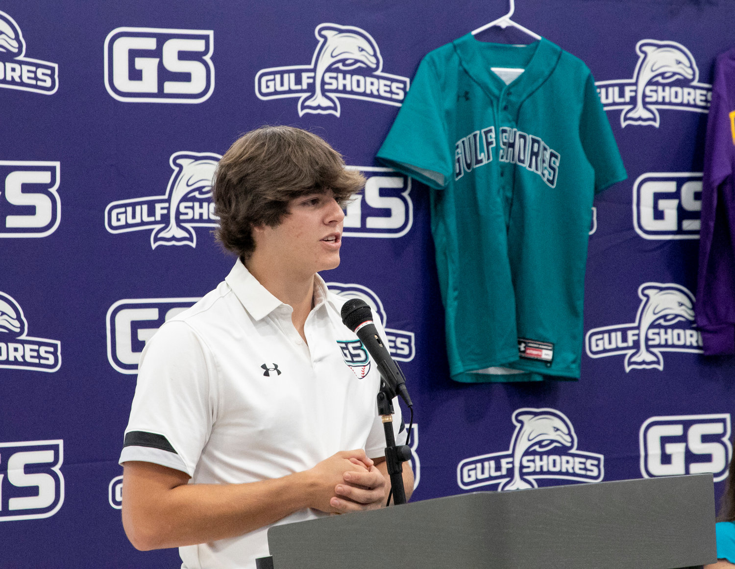 Dolphin catcher Dominic Maldet speaks to the audience in attendance of Wednesday’s signing ceremony where he signed with the Montevallo Falcons. Maldet has already caught 459 innings in 71 games through two varsity seasons with Gulf Shores.