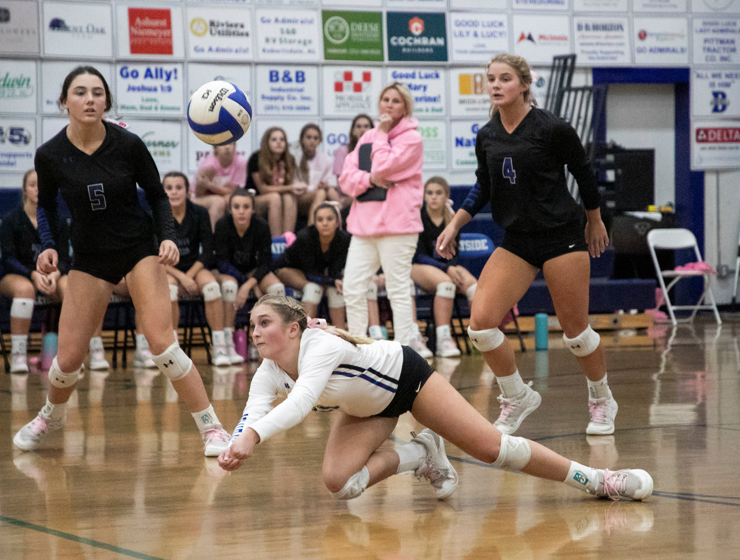 Admiral freshman Mary Katherine Whitehurst extends for a dig during Bayside Academy’s home match against Baldwin County in the Class 6A Area 2 Tournament Oct. 13. According to MaxPreps stats, Whitehurst racked up the most digs in the nation (654) for athletes in the Class of 2026.