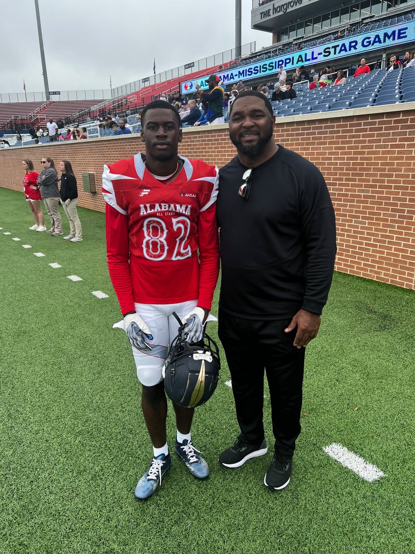 Foley senior Harrison Knight poses with Lion head football coach Deric Scott at the 36th annual Alabama-Mississippi All-Star Classic Saturday, Dec. 10, at Hancock Whitney Stadium on the campus of the University of South Alabama.