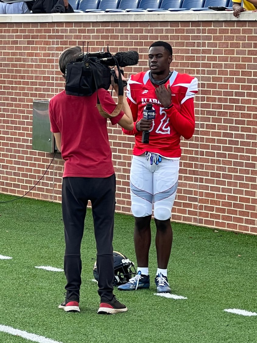 Foley’s Harrison Knight does an on-camera interview at Hancock Whitney Stadium in Mobile at the 36th annual Alabama-Mississippi All-Star Classic Saturday afternoon, Dec. 10. Knight finished his senior season with 64 receptions for 711 receiving yards and 8 touchdowns.