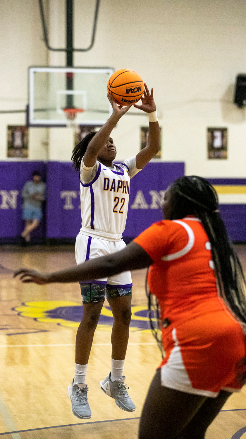 Daphne junior La’Merrica Johnson rises for a shot in the second half of the Trojans’ basketball game against the Baldwin County Tigers Tuesday night at home. Johnson contributed 14 points and 7 rebounds to Daphne’s 49-22 non-area win.