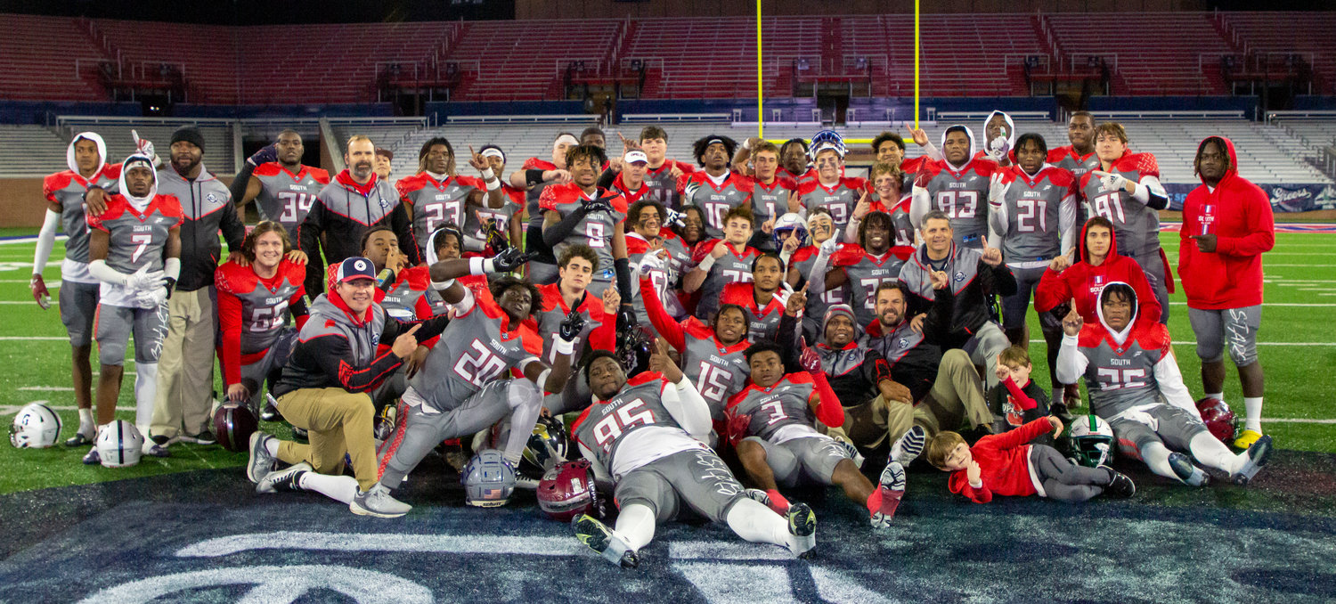 The South All-Stars gather for a team photo after they won the 64th all-star game 42-7 over the North All-Stars Friday, Dec. 16, at Mobile’s Hancock Whitney Stadium on the campus of the University of South Alabama. The 42 points were the most points scored in a win all-time.