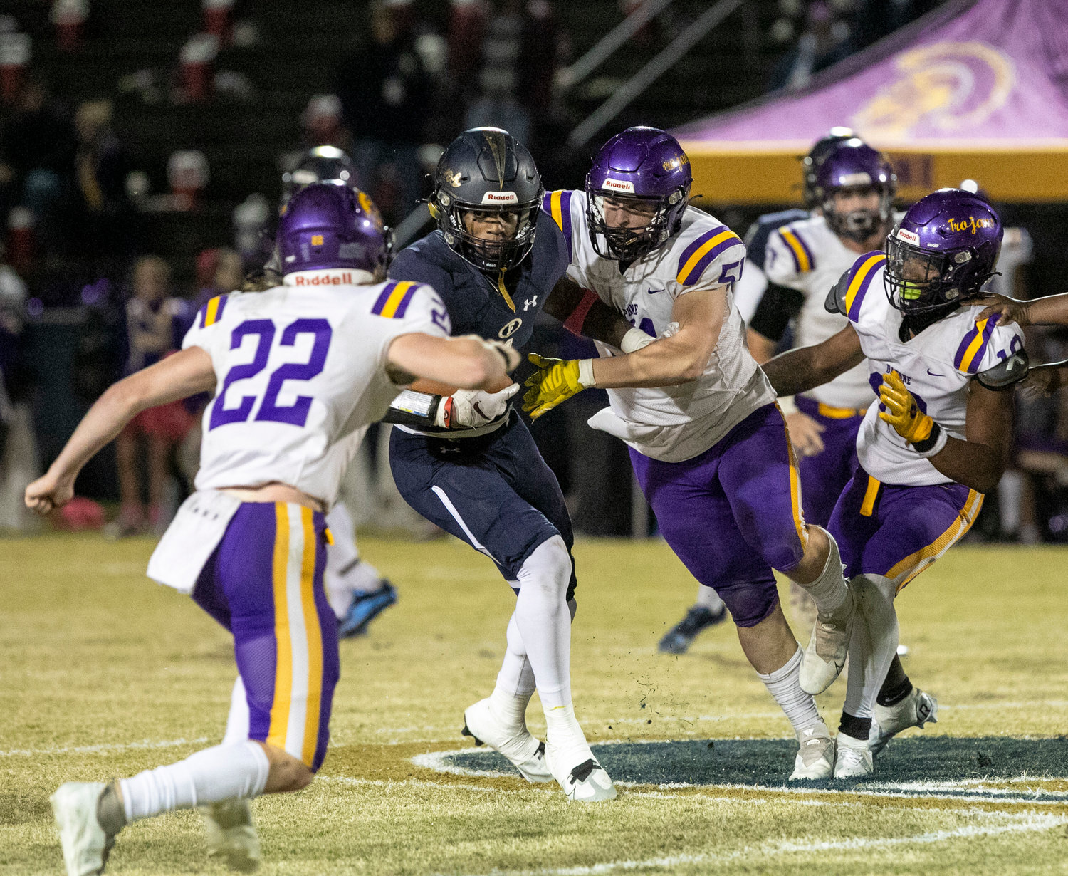 Foley junior Perry Thompson fights off Daphne tacklers during the Class 7A Region 1 contest between the Lions and Trojans at Ivan Jones Stadium Oct. 21. Thompson was chosen as a first-team all-state selection after Foley won its first region title since 2007.