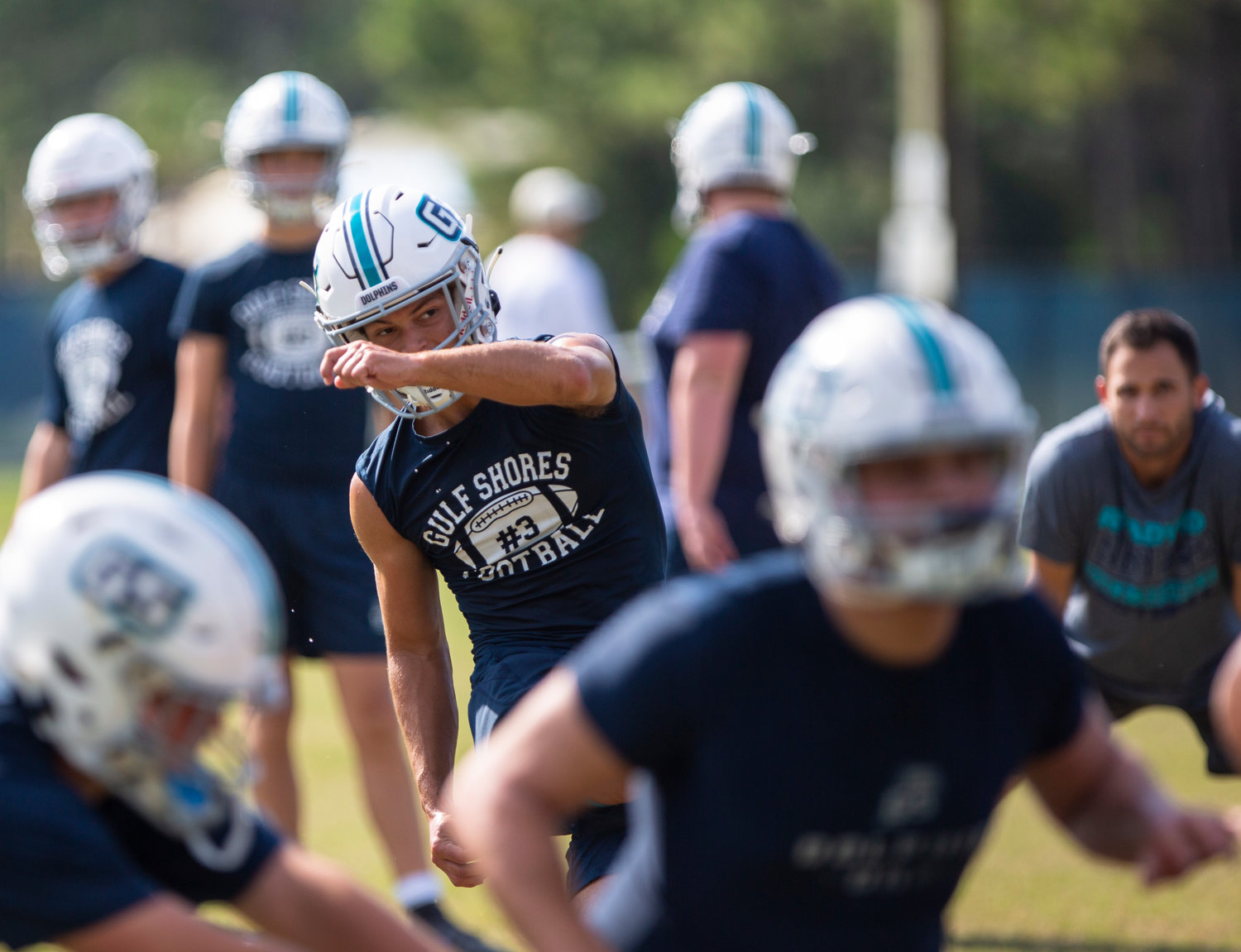 Gulf Shores’ Will Langston drives a point-after try during the Dolphins’ Sept. 8 practice at the high school. Langston was named to the second-team all-state defense as a punter after Gulf Shores hosted the first playoff game in school history in 2022.
