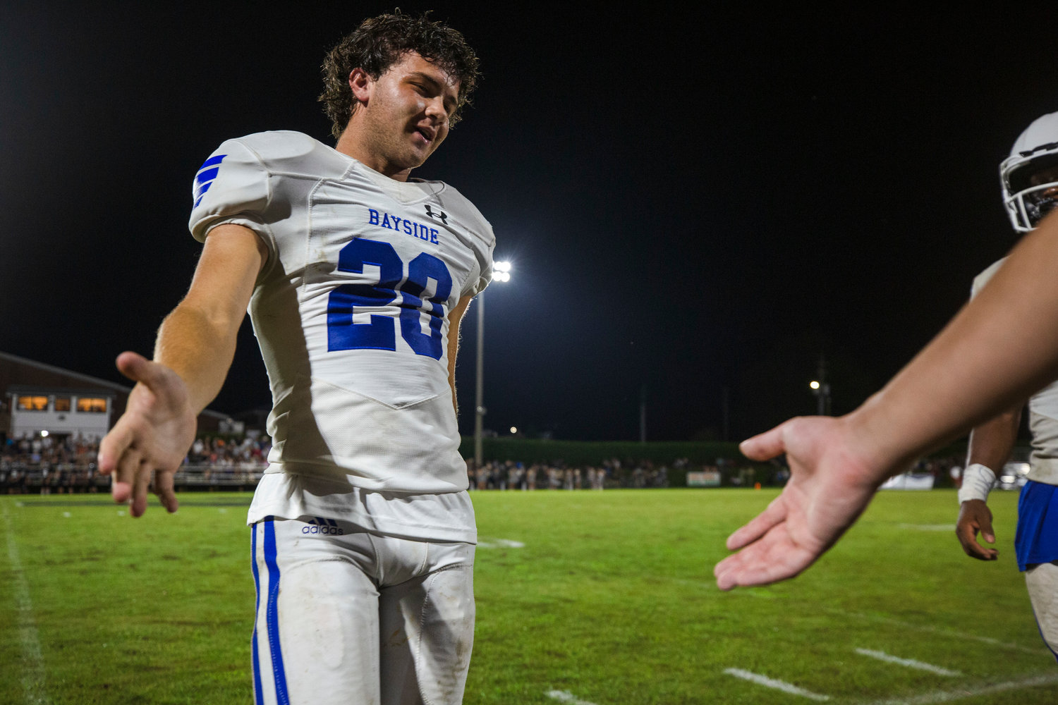 Bayside Academy’s Joey Jones gets acknowledged on the sideline after the Admirals’ season-opening game against the Elberta Warriors on the road Aug. 19. Jones was a second-team all-state selection as a placekicker after he helped Bayside Academy to a fourth straight playoff berth.