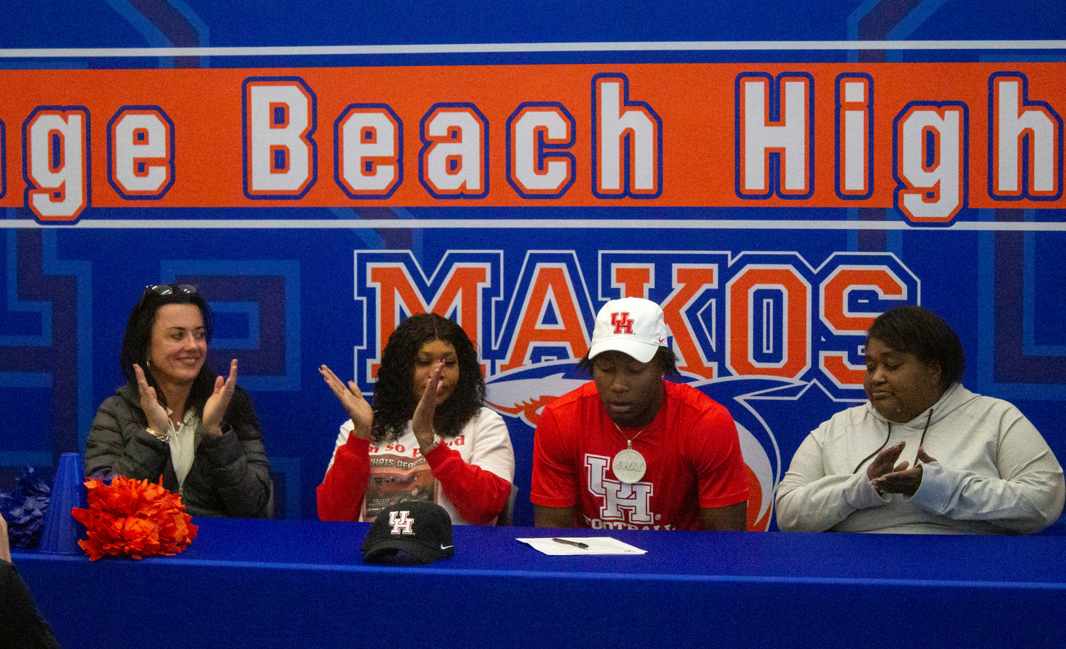 Chris Pearson was joined by family in putting pen to paper to cement his pledge to the University of Houston football team Wednesday, Dec. 21, as part of National Signing Day.