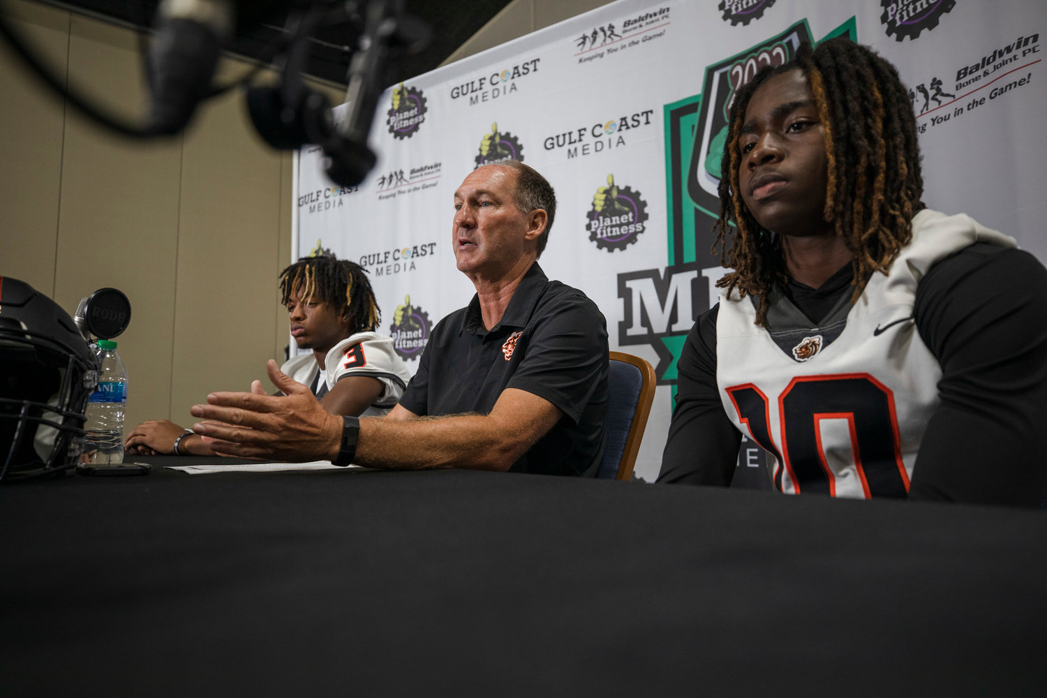 Baldwin County head coach Scott Rials was joined by Ky McNulty (3) and DJ Baker (10) at the inaugural Gulf Coast Media Day at the Orange Beach Event Center Aug. 16, 2022. The second annual event will once again preview the upcoming season featuring the local coaches and players.