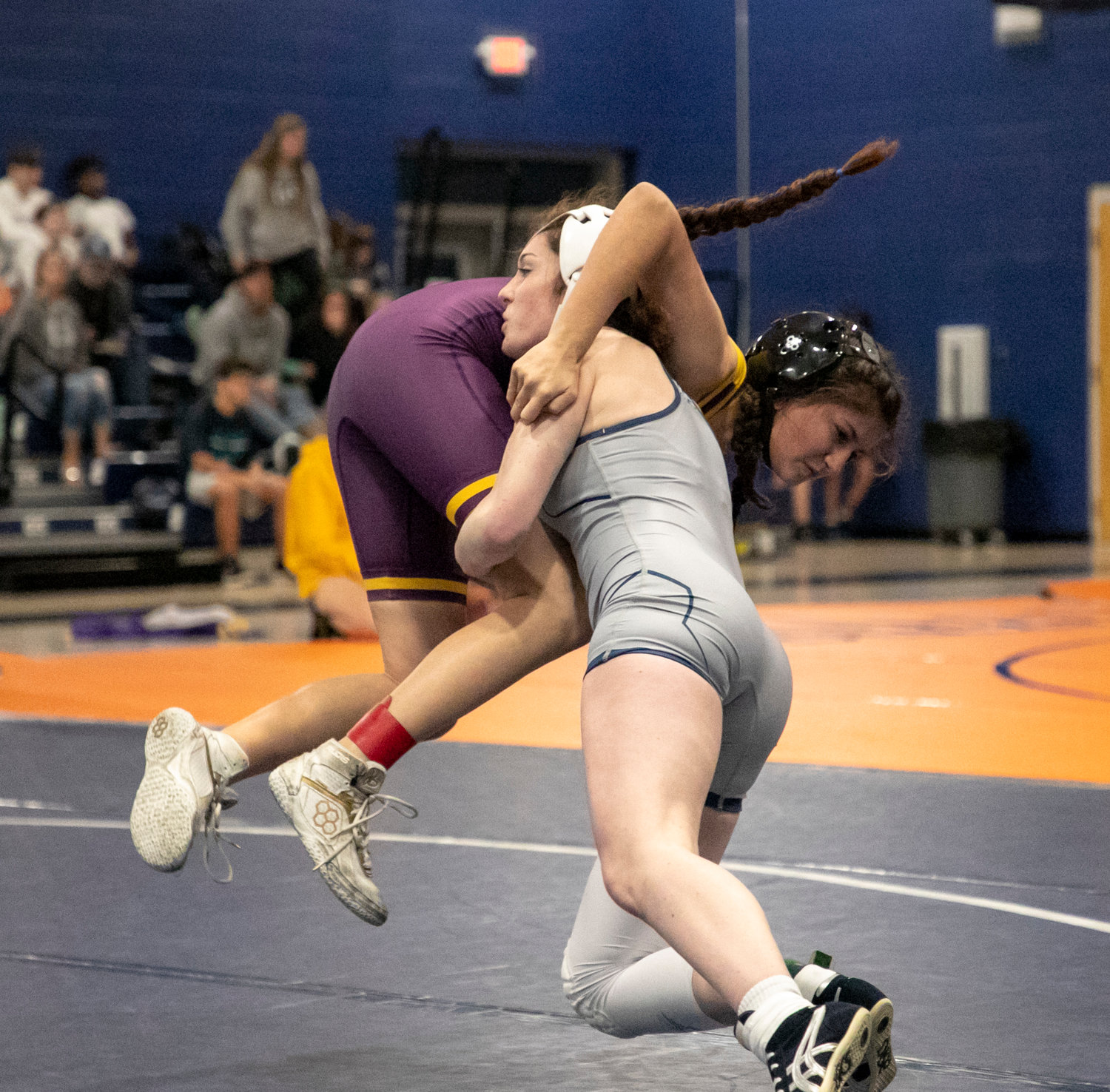 Gulf Shores’ Leah Guthrie drives Daphne’s Sloane Dyess during the 120-pound semifinal at Gulf Shores High School during Jan. 6’s Baldwin County Championships. Guthrie went on to win the class to help the host Lady Dolphins finish as team runners-up.