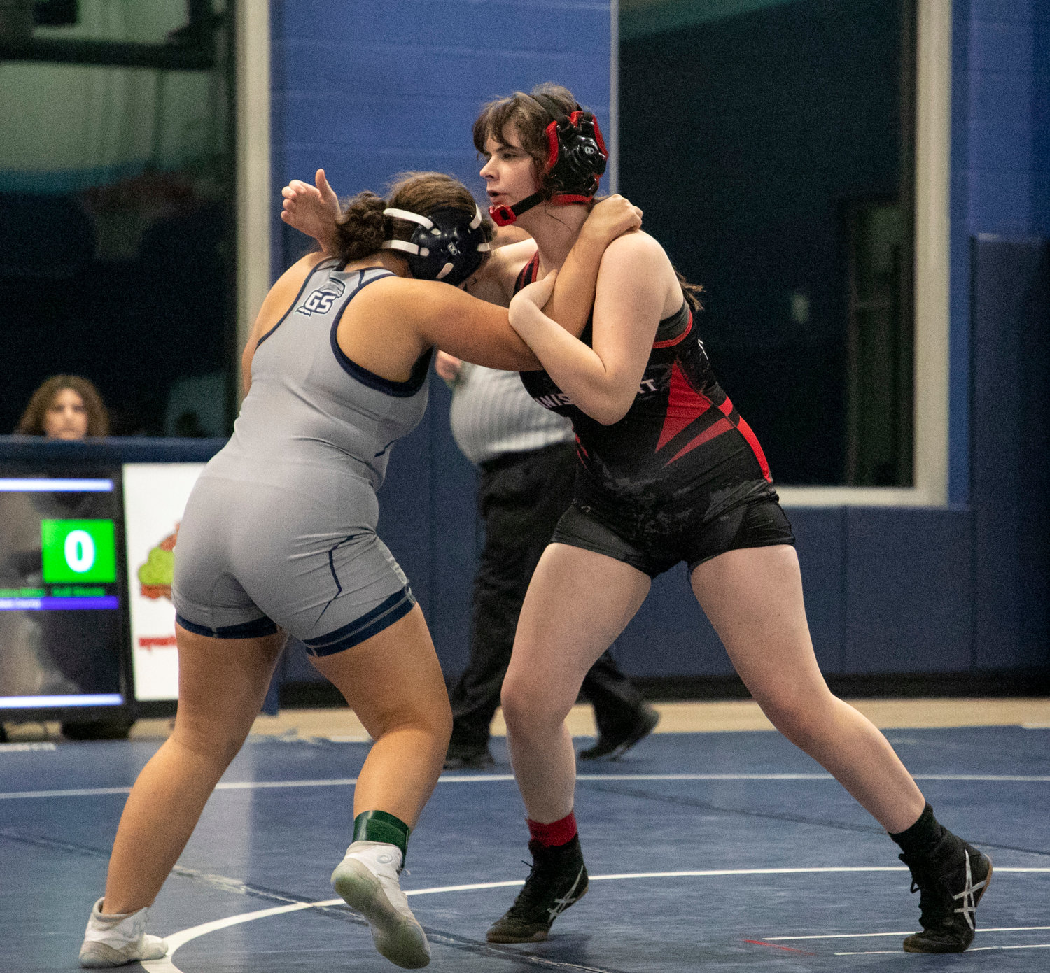 Abigail Pendergrass from Spanish Fort looks to snap down Gulf Shores’ Elizabeth Bezerra-Miller during the semifinal round of the 152-pound class during the Baldwin County Championships in Gulf Shores Friday night. Pendergrass eventually won the class as one of two Toros to earn all-county honors.