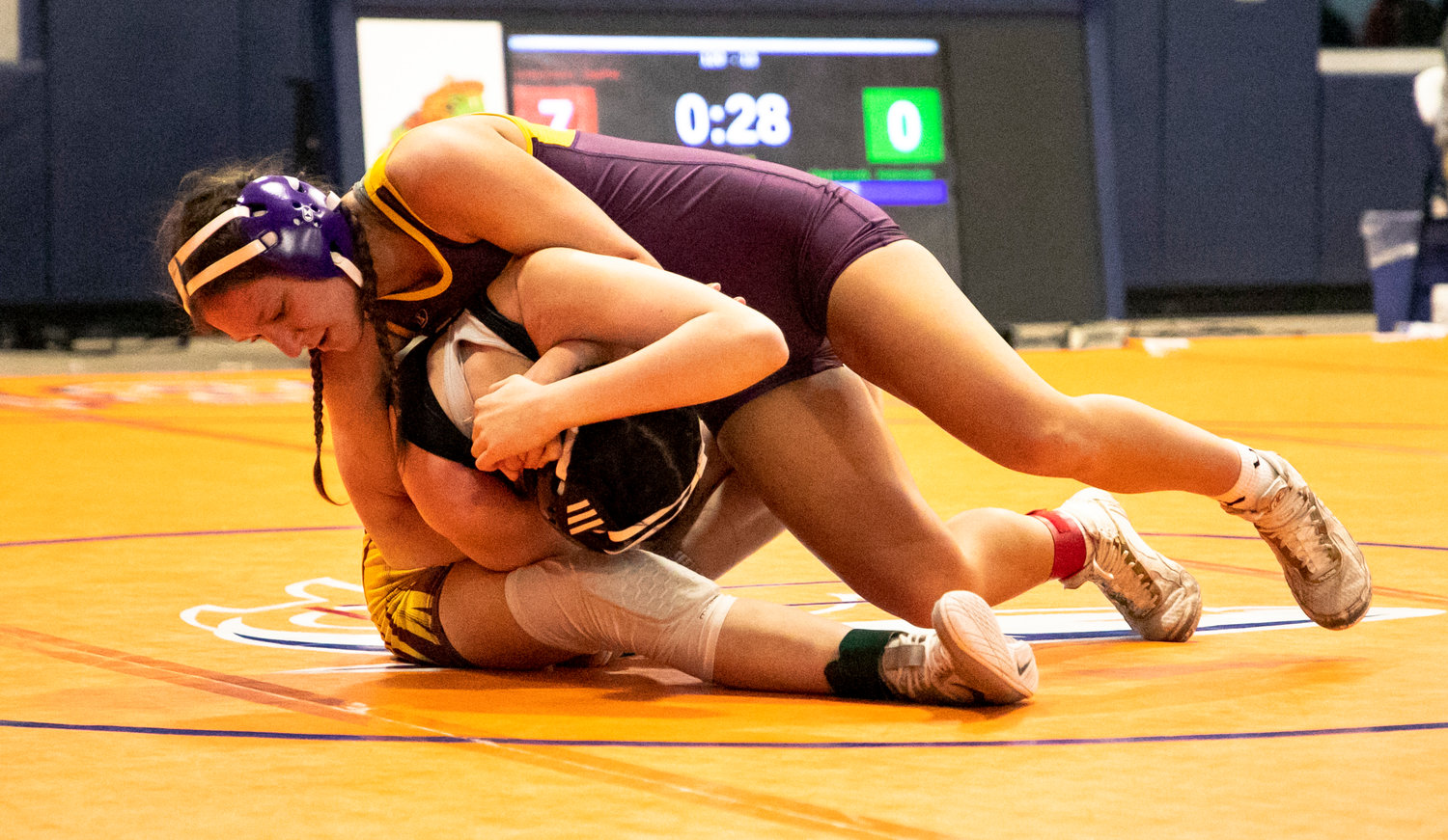 Daphne’s Stella Hawks looks to roll over Robertsdale’s Charli Knotts in the 120-pound semifinal at Gulf Shores High School Friday, Jan. 6, during the Baldwin County Championships. Hawks took second as one of eight Lady Trojans to take home all-county distinction.