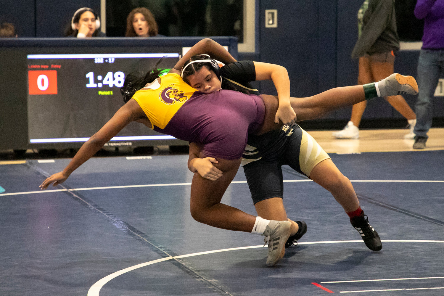 Lelahn Iopu from Foley looks to takedown Taliah Wade from Daphne during the 152-pound semifinal at Gulf Shores High School Friday, Jan. 6, as part of the Baldwin County Championships. Iopu went on to finish third in the class as one of four Lady Lions to earn podium finishes.
