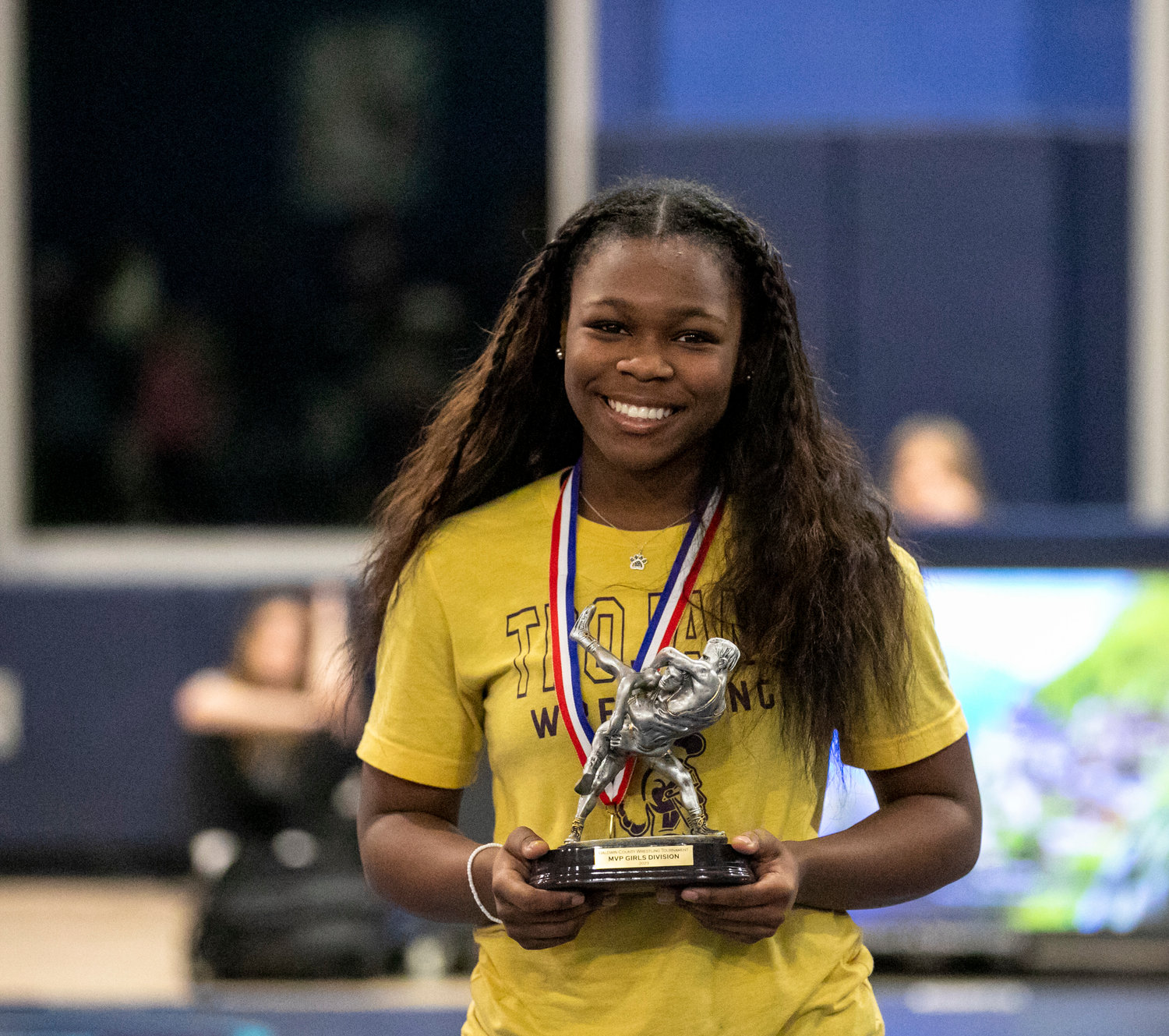 Kalyse Hill took the Most Valuable Wrestler trophy back to Daphne with her and her Lady Trojan teammates who won the team title from the Baldwin County Championships in Gulf Shores Friday, Jan. 6. Her individual championship marked an eighth straight tournament victory for Hill.