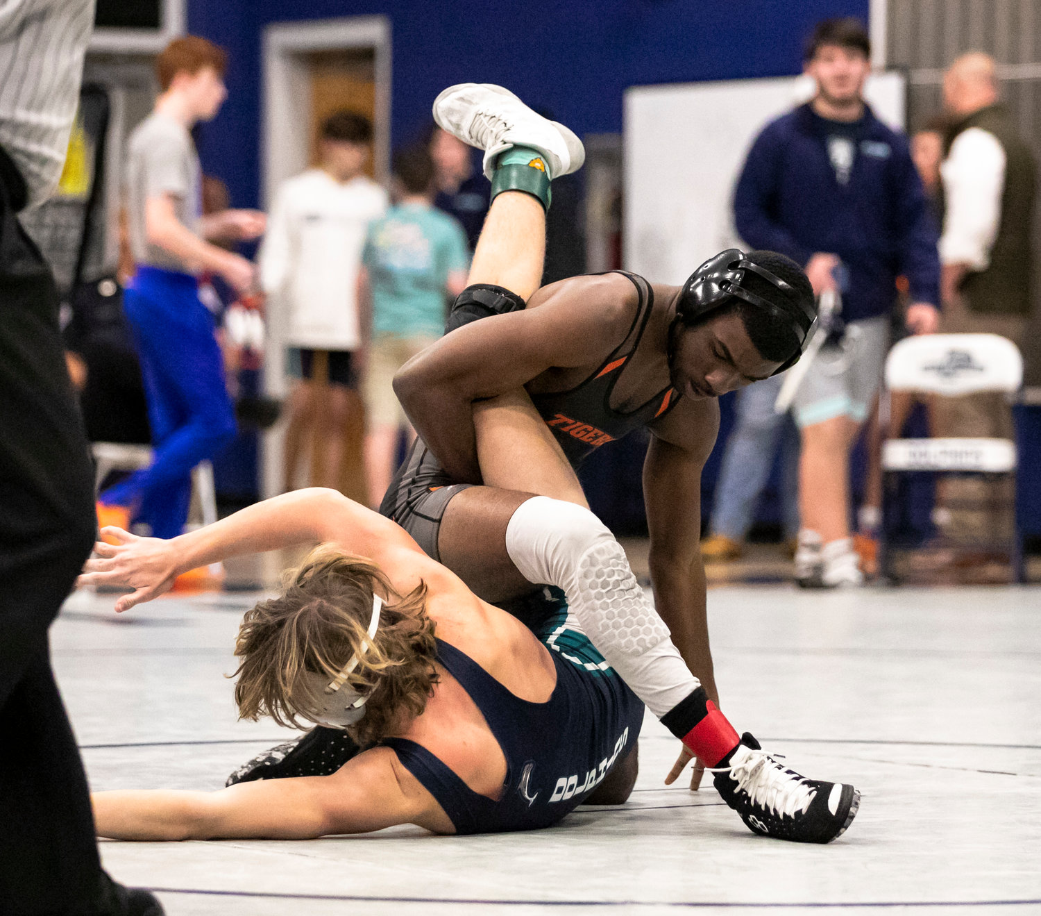 Baldwin County’s Joaquin Crook scores points in the opening round of the 132-pound class during the Baldwin County Championships at Gulf Shores High School Friday, Jan. 6. Crook recorded a third-place finish as one of the Tigers’ three all-county wrestlers.