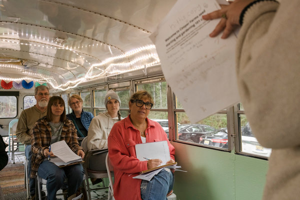 Kitti Cooper in her bus turned classroom teaching one of her Organic Gardening for Beginners class in December.