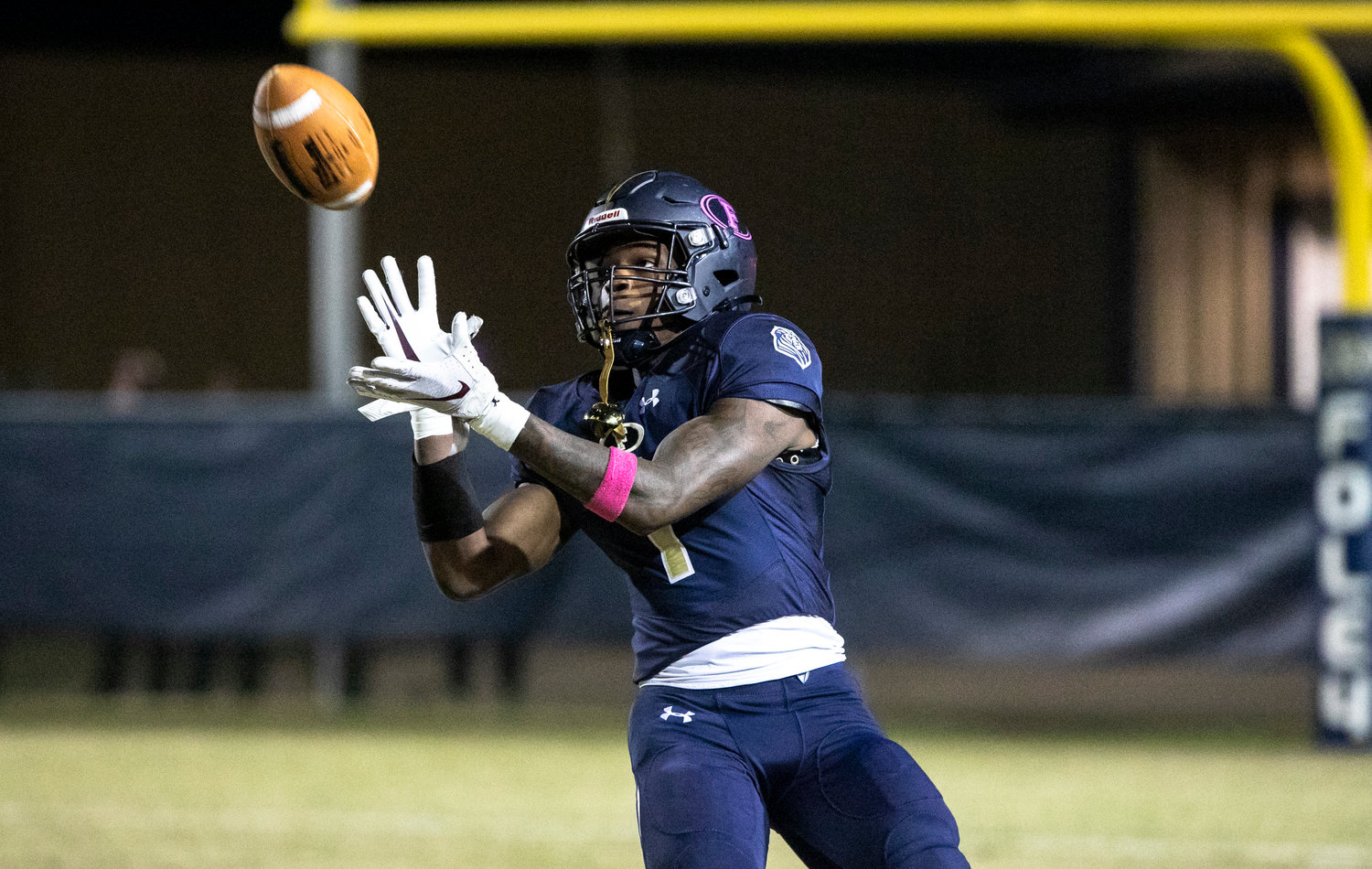 Foley junior Perry Thompson looks in a punt during the Lions’ Class 7A Region 1 game against the Daphne Trojans at Ivan Jones Stadium Oct. 21, 2022. Thompson was one of 16 Foley Lions named all-county by Baldwin County Public Schools.