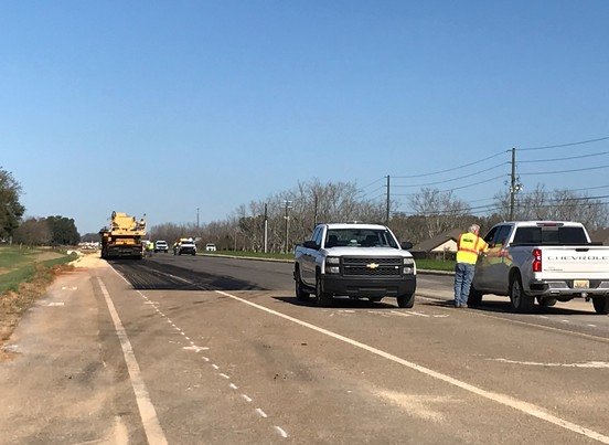 Crews work to pave what will be the southbound lanes of Alabama 181 near Fairhope. The project had been scheduled to be completed by December, but officials said the highway may not be open until March.