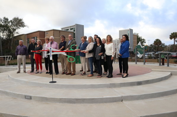 Foley officials cut the ribbon to dedicate the new Pine Street Park. The park is planned as one of a series of small recreation facilities, called pocket parks, to be constructed around the city.
