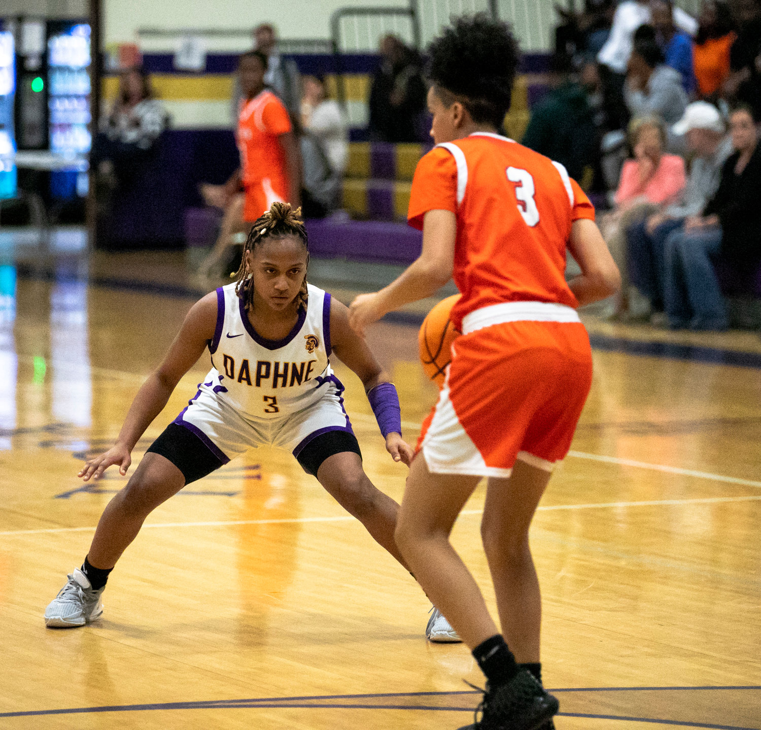 Daphne freshman Abagail Johnson eyes the ball in the backcourt of the Lady Trojans’ non-area contest against the Baldwin County Tigers at Daphne High School Dec. 13, 2022. The Lady Trojans checked in at No. 9 in the newest edition of the coaches’ poll from the AABC where the Foley Lady Lions joined them at No. 6.