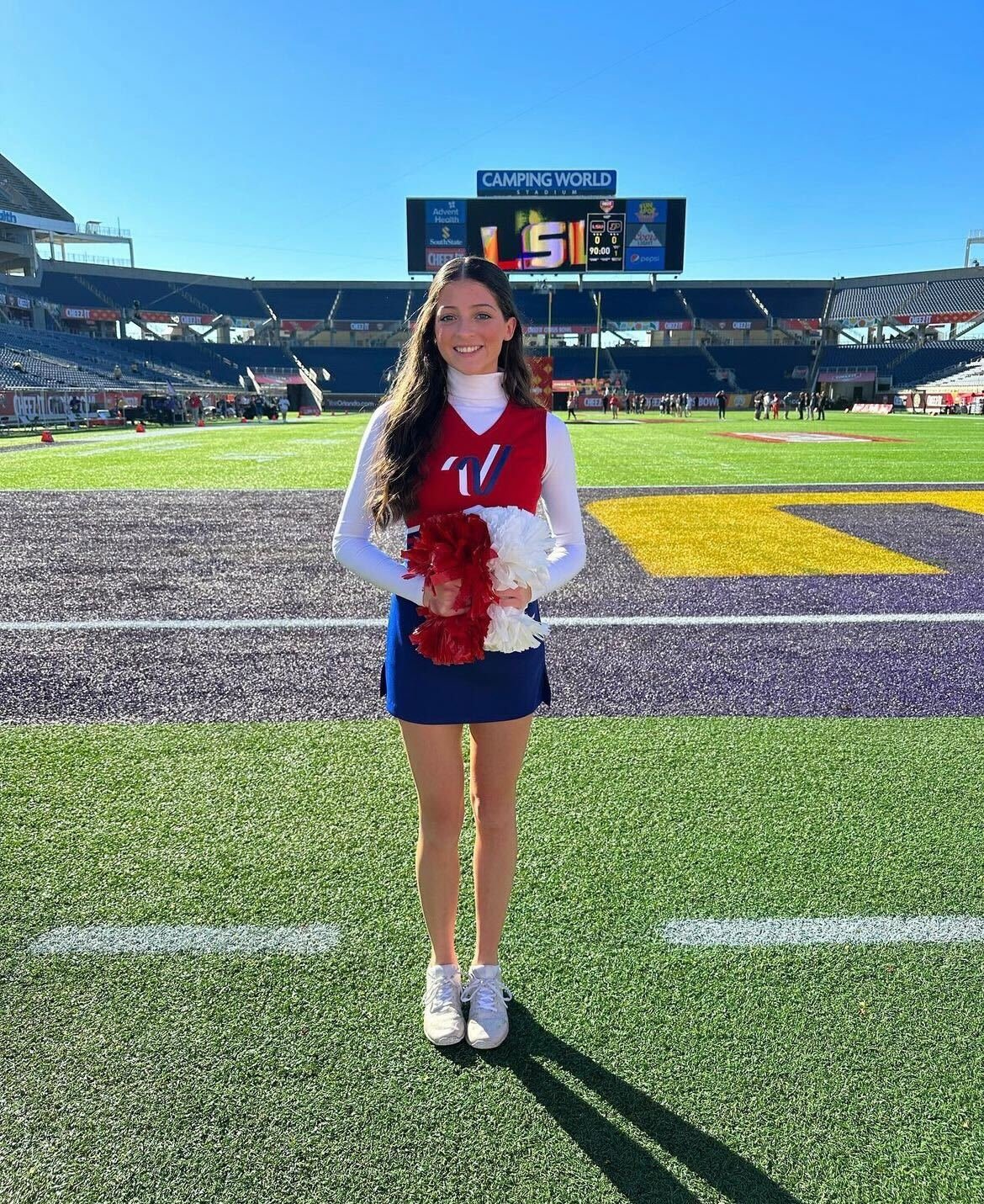 Fairhope senior Michelle Bossard was one of the All-American cheerleaders that participated in the on-field performance at the Cheez-It Citrus Bowl at Camping World Stadium in Orlando Jan. 2. It was not long ago that a shoulder injury nearly ended the cheerleading career of Bossard but she battled back to also earn a college opportunity with the University of Mobile.