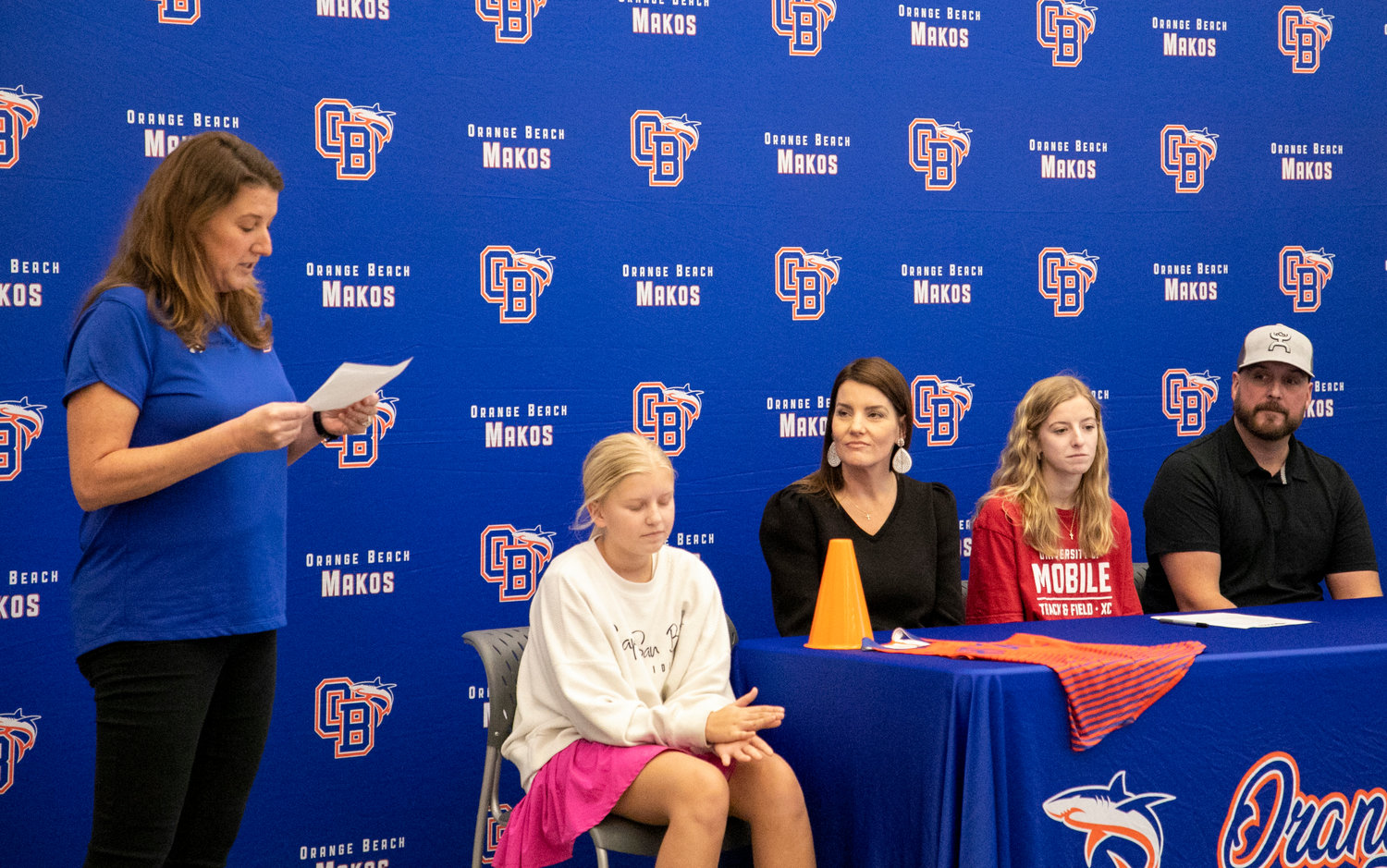 Mako head cross country coach Rachel Ellsworth shared some remarks on Claire Atkins’ decorated running career at Orange Beach High School during Wednesday’s signing ceremony where Atkins marked the first Mako athlete to sign with a college cross country team.