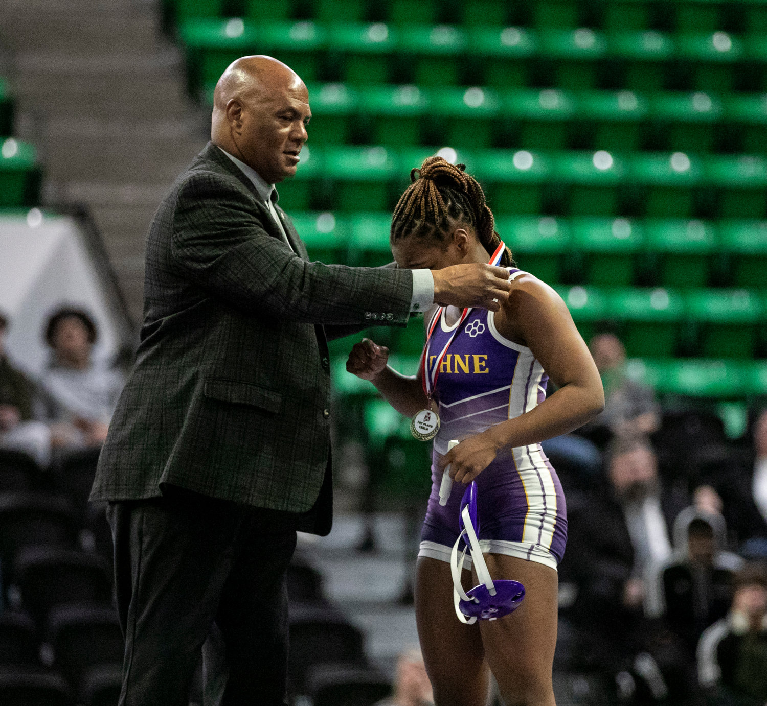 Kalyse Hill is crowned the 132-pound state champion by AHSAA Executive Director Alvin Briggs Friday afternoon at Bill Harris Arena in Birmingham after she won her match by decision over Tuscaloosa County’s Raya Carpenter.