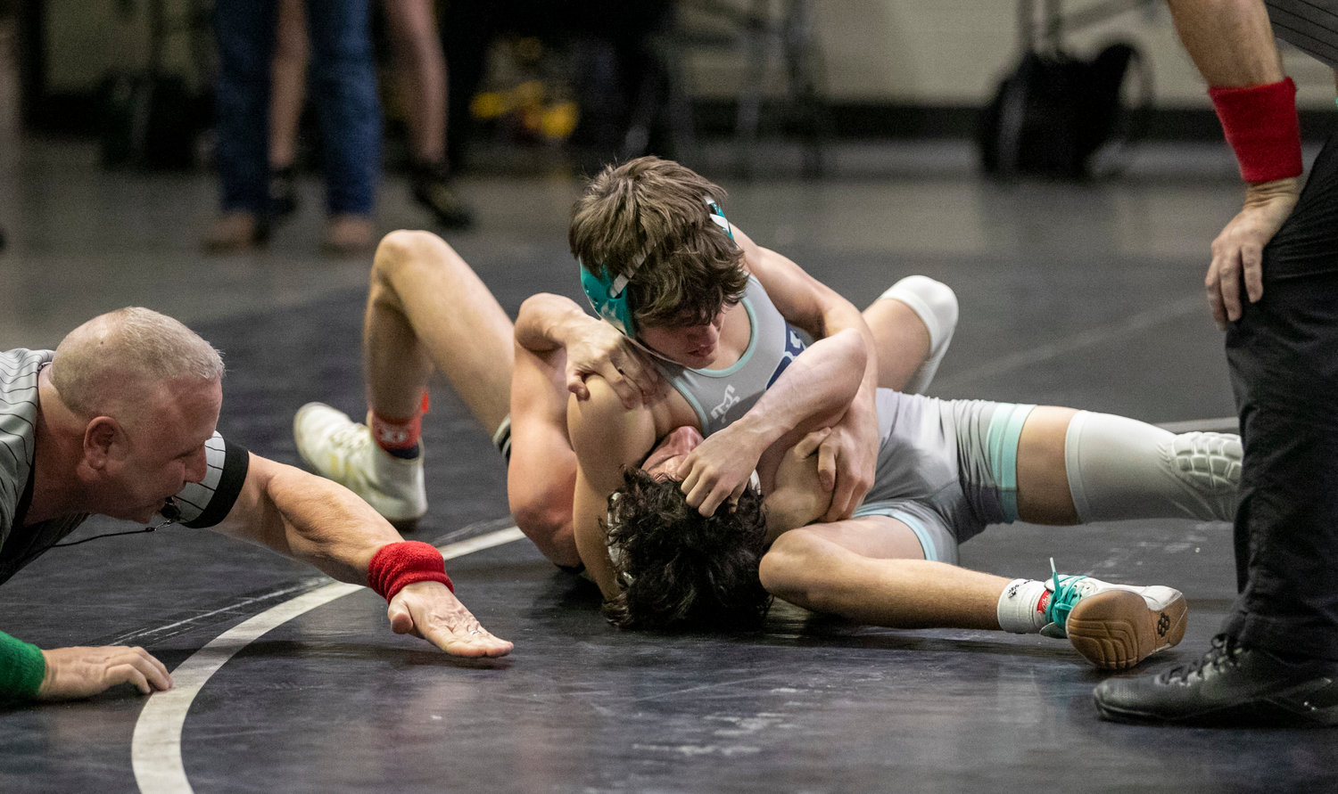Gulf Shores’ Hayden Cook locks in a pin during the 115-pound match of the Class 5A dual consolation finals at Bill Harris Arena in Birmingham Friday, Jan. 20. Cook’s was one of two pins in the final two matches that helped the Dolphins claim third place in Class 5A with a 37-27 win over Hayden.