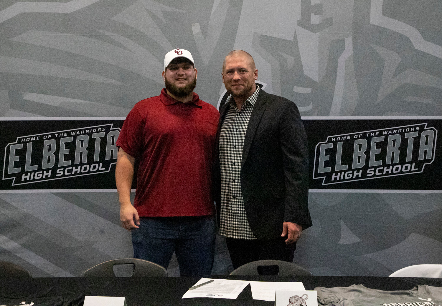 Warrior head football coach Nathan McDaniel joined Cason White on National Signing Day after Elberta’s five-year starting center signed his National Letter of Intent to join the Campbellsville Tigers Wednesday, Feb. 1.