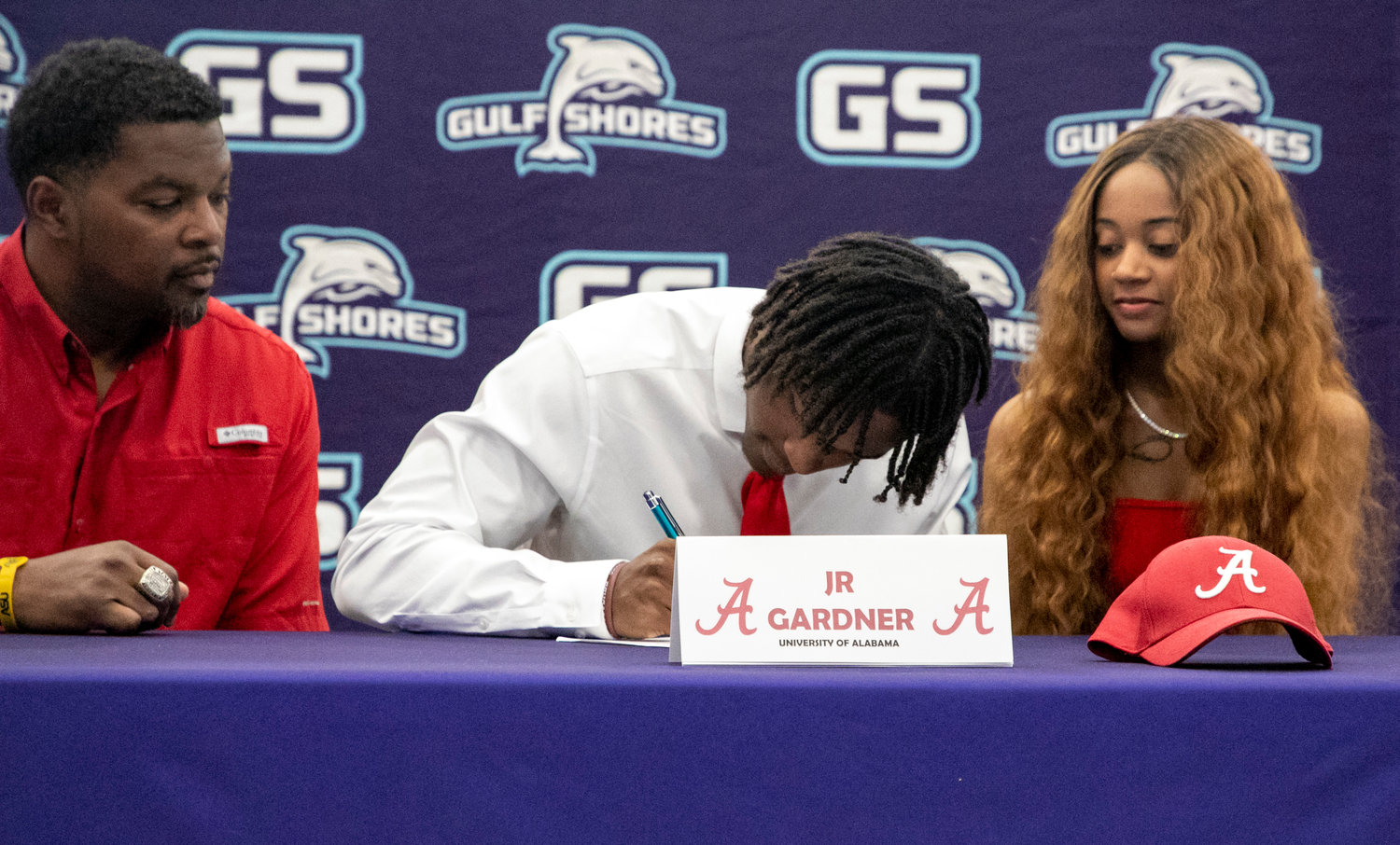 J.R. Gardner accepted a preferred walk-on offer to the University of Alabama and signed his National Letter of Intent Wednesday, Feb. 1, during a ceremony at Gulf Shores High School. Gardner joined the National Signing Day celebrations and was one of five from the Dolphins’ 11-win, state quarterfinal team to sign with colleges Wednesday.